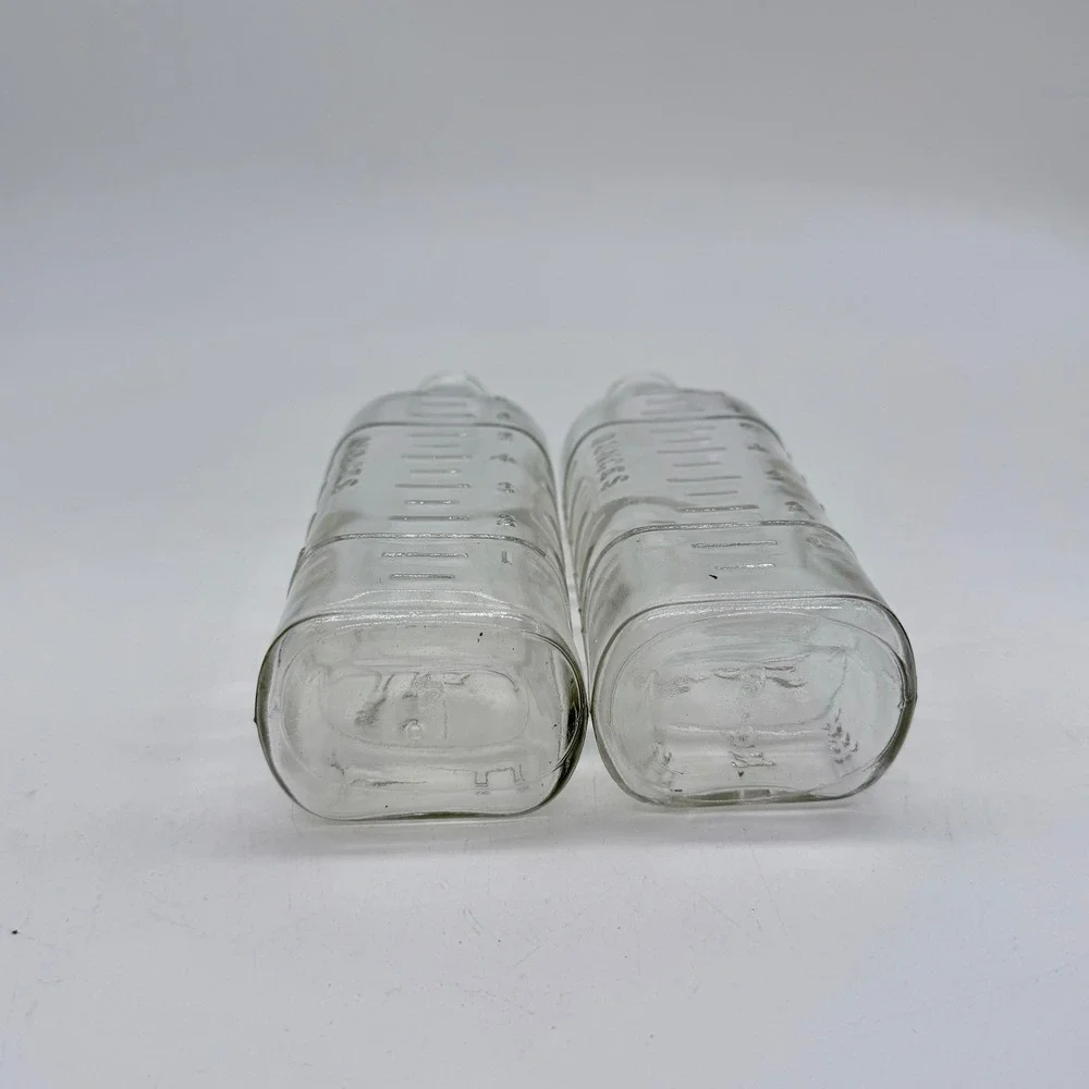 Vintage Embossed Glass Milk Bottle Dog and Rabbit Scene Set of 2